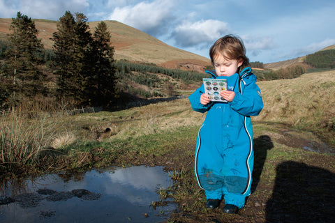 Child looking for frogspawn